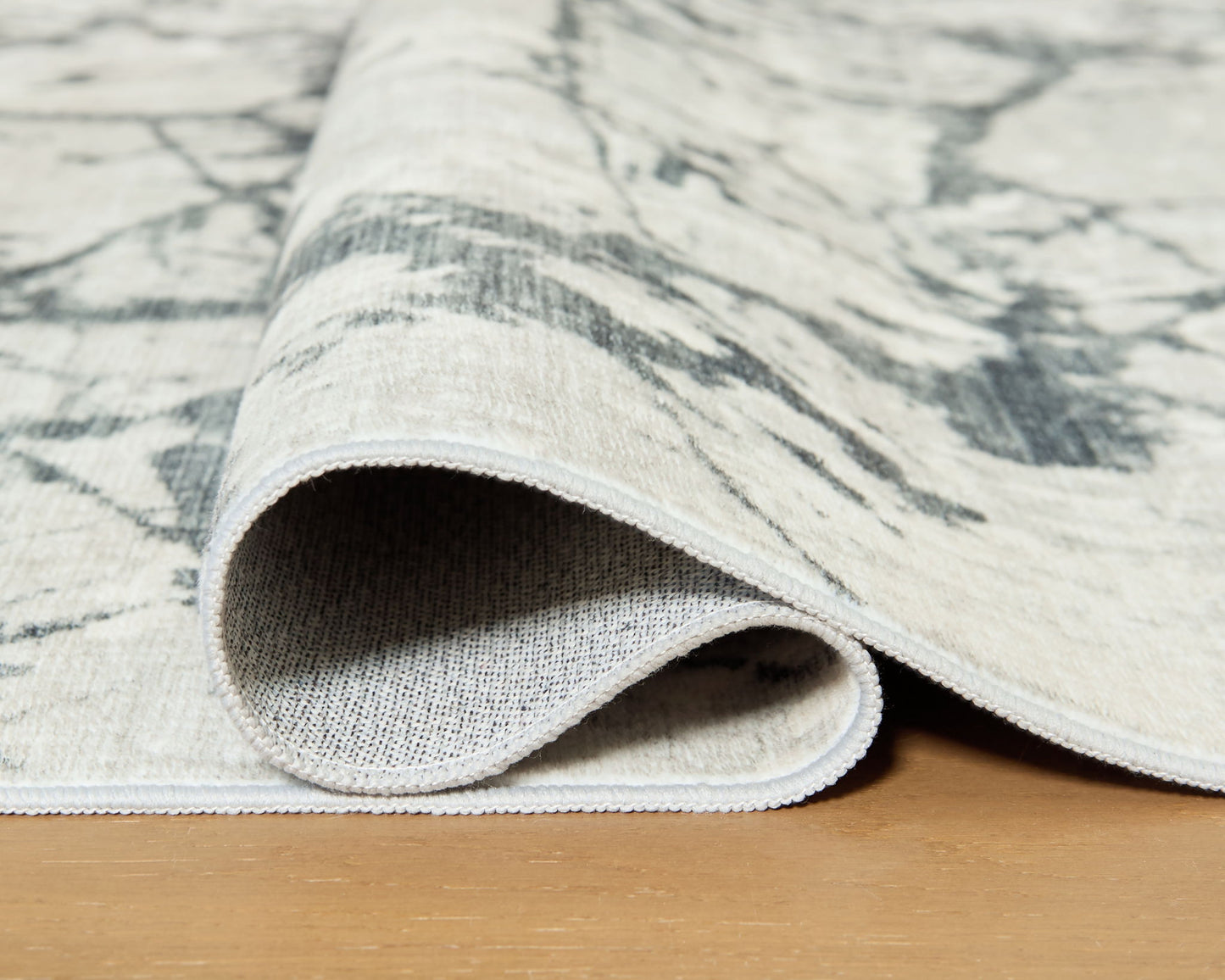 Tobinbury - 5' x 7' Washable Rug - Gray